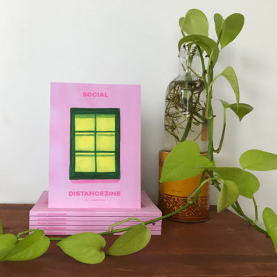 Social Distancezine with a neon pothos plant