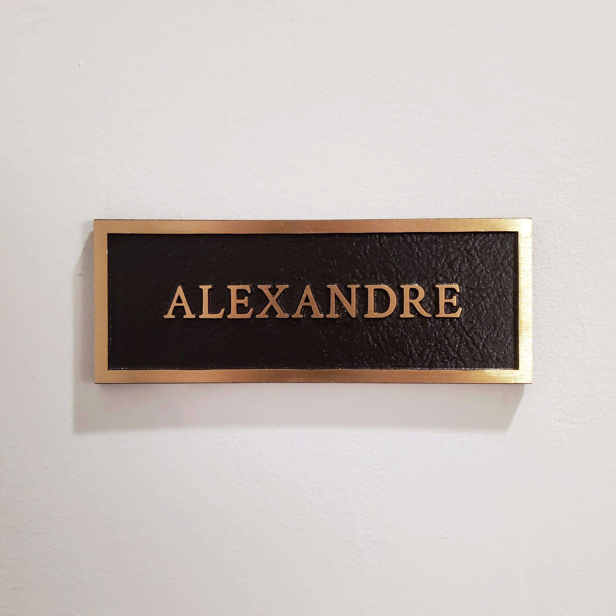 Alexandre Gallery bronze sign